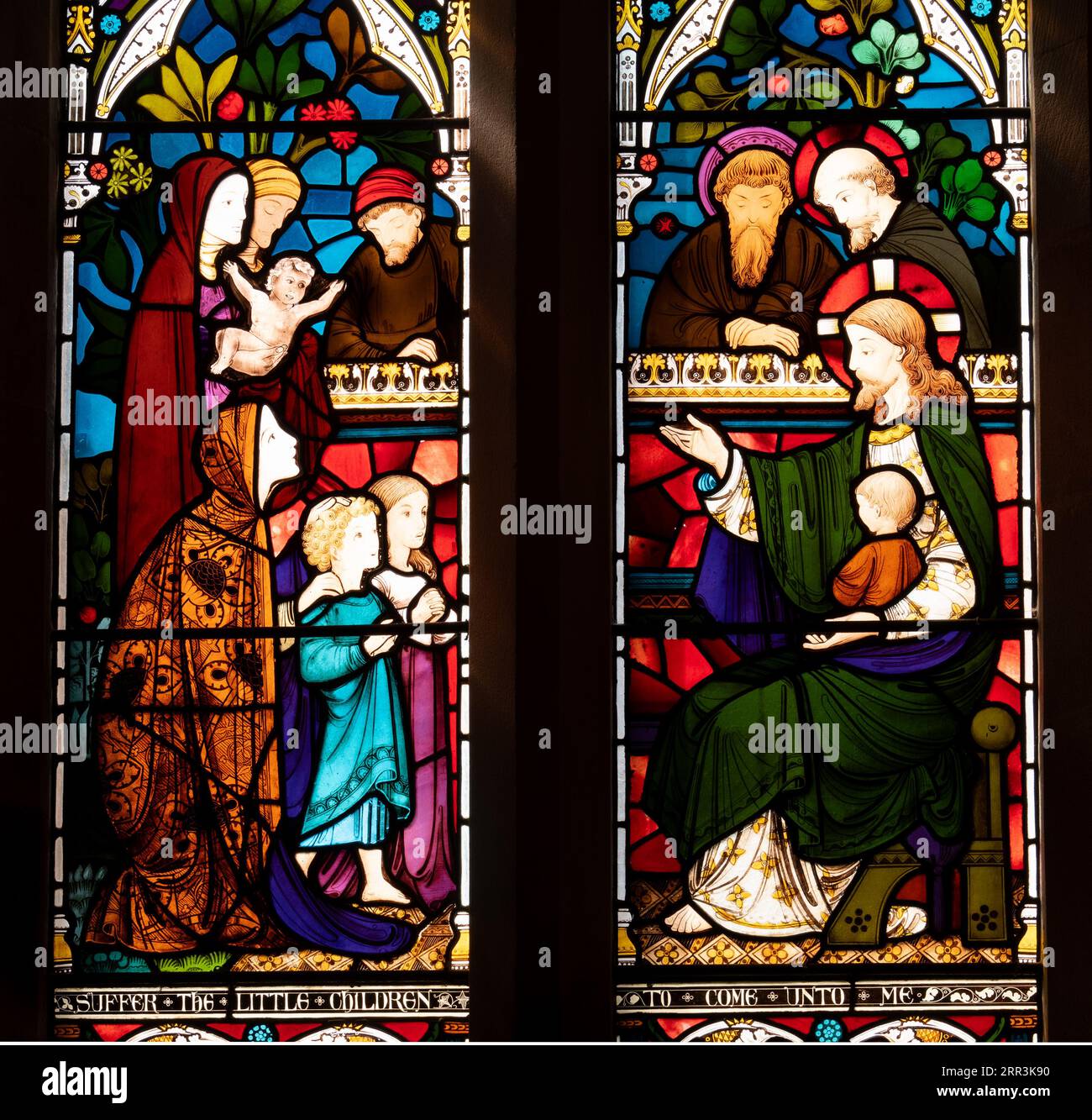 Soffri le vetrate dei bambini piccoli, All Saints Church, Allesley, West Midlands, Inghilterra, REGNO UNITO Foto Stock