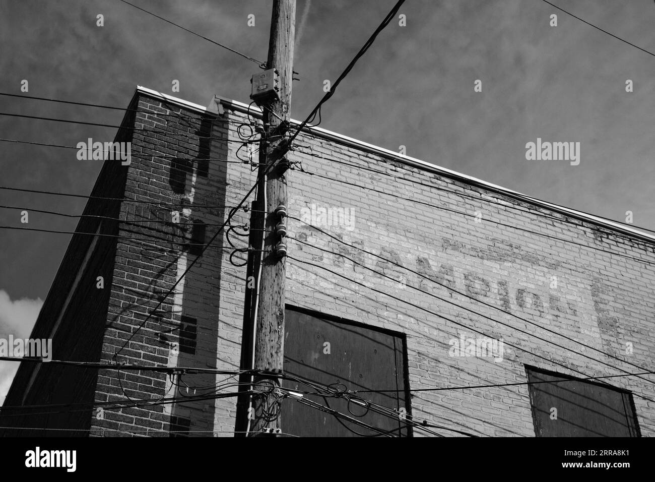 Cartello della candela Champion sbiadito dipinto su un vecchio edificio a Bay City, Michigan Foto Stock