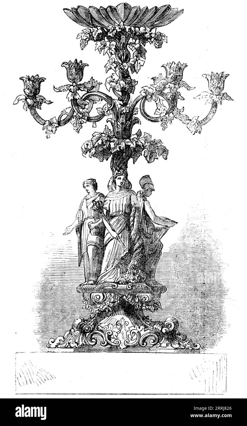 Testimonianza presentata mercoledì scorso all'Alderman e alla signora Finnis, 1858. "La testimonianza... è composta da due magnifici candelabri d'argento, alti quasi tre metri, per dodici lucernari...[sulle basi] si trovano sei figure femminili...[che rappresentano] la giustizia, con spada ed equilibrio; legge, con un libro aperto; dignità civica, la mazza e le insegne dell'ufficio; Carità, un gruppo di tre figure; simpatia, con borsa aperta; la città di Londra; scudo cittadino, corona murale, &amp;c.. A strapiombo sulle figure si trovano ricchi rotoli, con foglie di vite e uva pendente. I pannelli sulla base portano i bracci della f Foto Stock