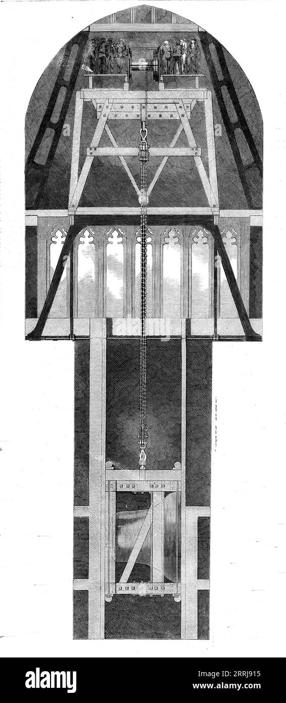 Modalità di alzare la grande Campana, 1858. "Big Ben" installato nel campanile del Palazzo di Westminster a Londra. "Nel dare un'idea del processo di sollevamento della grande campana, è necessario ricordare che il pozzo su cui la campana è salita si trova al centro della Torre dell'Orologio, ed è leggermente più di 11 piedi 4 pollici per 8 piedi 2 pollici in proporzioni...un lato dell'albero era dotato di circa dodici o quattordici getti di gas, per illuminare l'interno durante l'avanzamento del lavoro...la culla aveva fissato ai lati quattro ruote di attrito, che suonava sulle guide-timbers... to Foto Stock