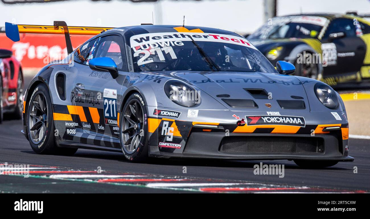 09 settembre 2023 Monterey, CA, U.S.A. driver Peter Ludwig #211 uscente dalla curva 11 durante il Firestone Grand Prix di Monterey Porsche Sprint Challenge gara 2 USA West al WeatherTech Raceway Laguna Seca Monterey, CA Thurman James/CSM Foto Stock