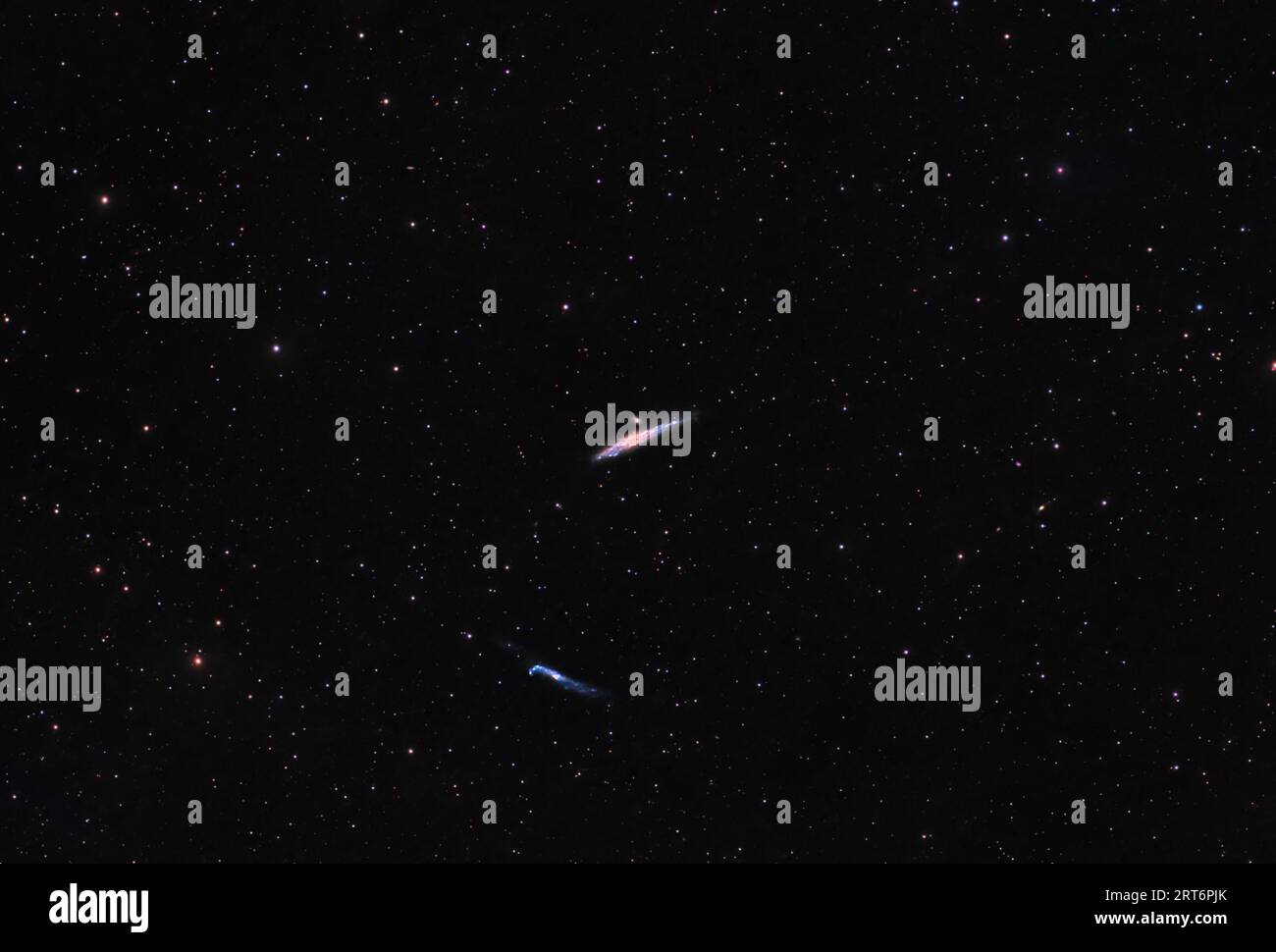 Balene e Hockey Stick galassie in Cosmic Harmony. Foto Stock