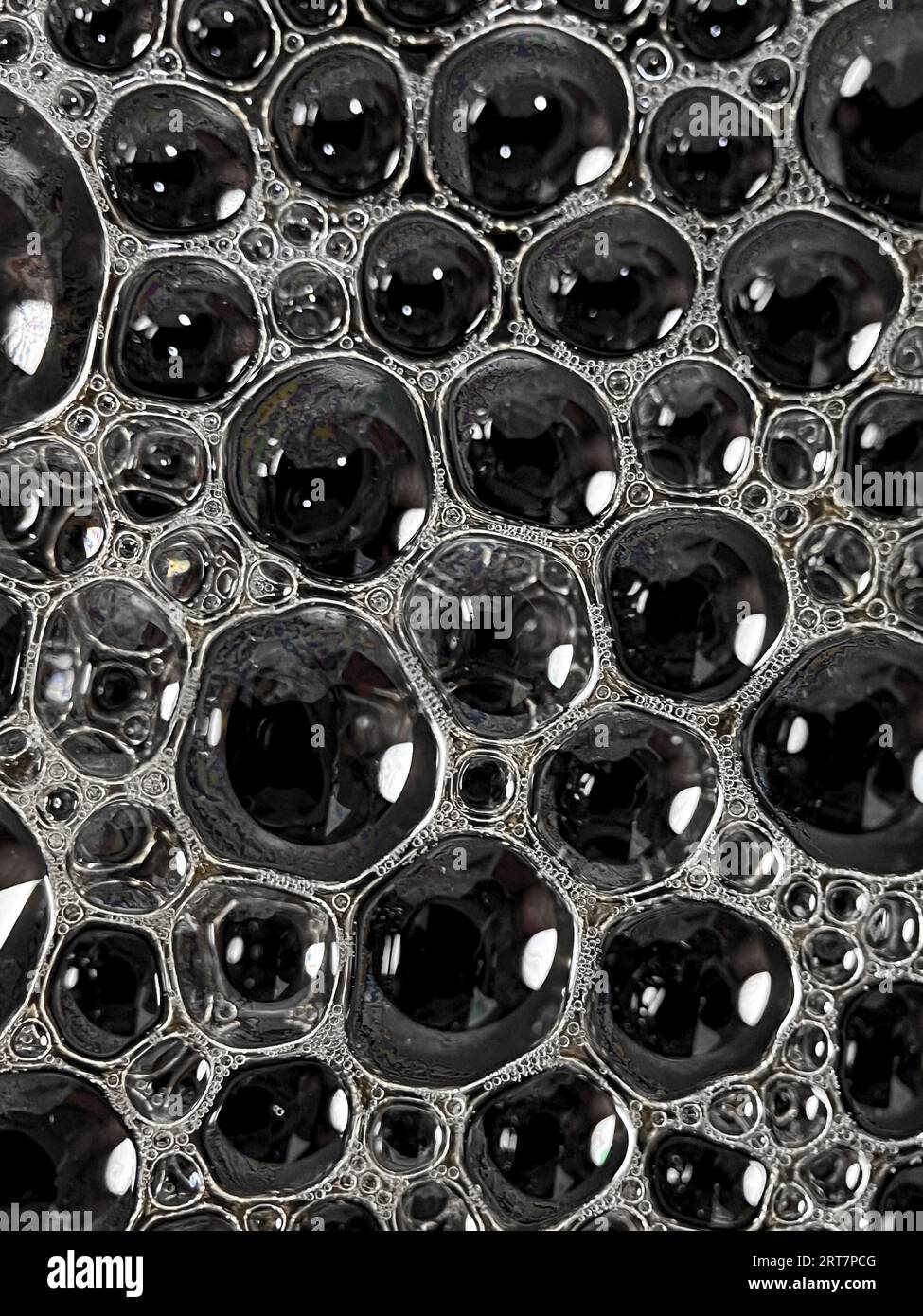 Schiuma di caffè extreme close up. Tessitura macro e sfondo Foto Stock