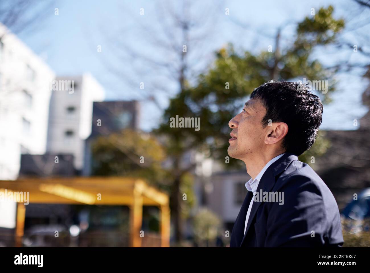 Uomo giapponese stressato Foto Stock