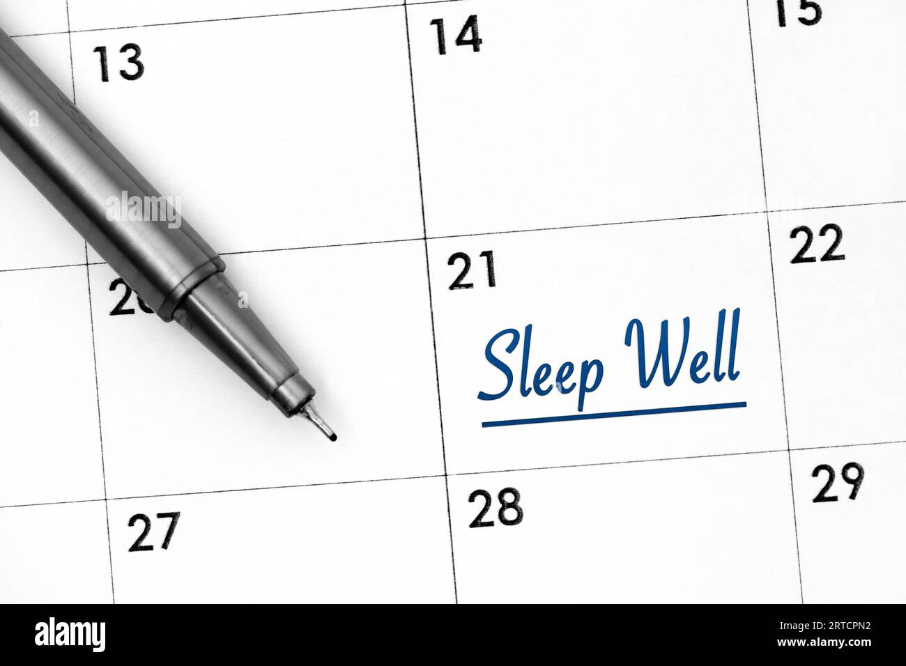 Data calendario con promemoria Sleep Well e penna vicina. Primo piano Foto Stock
