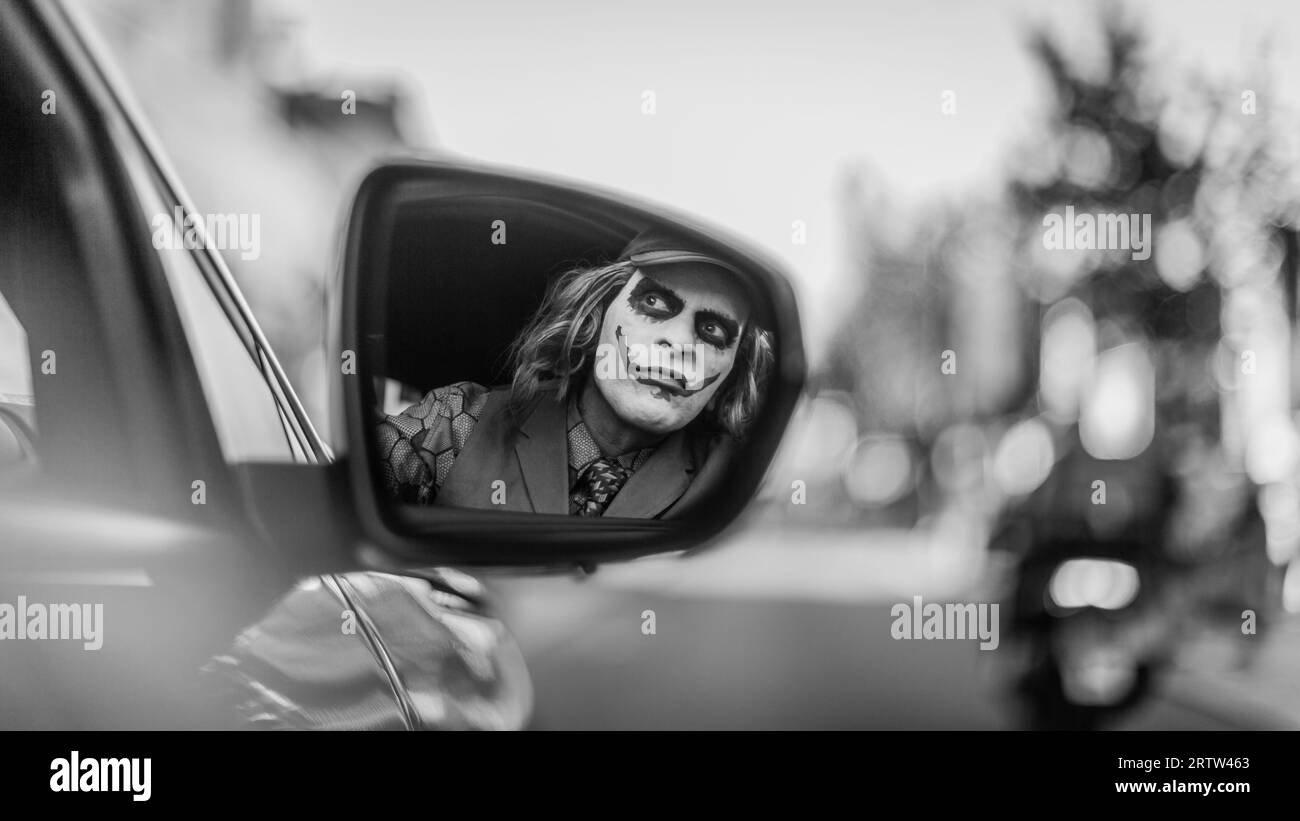 Il Joker nello specchio. Foto Stock