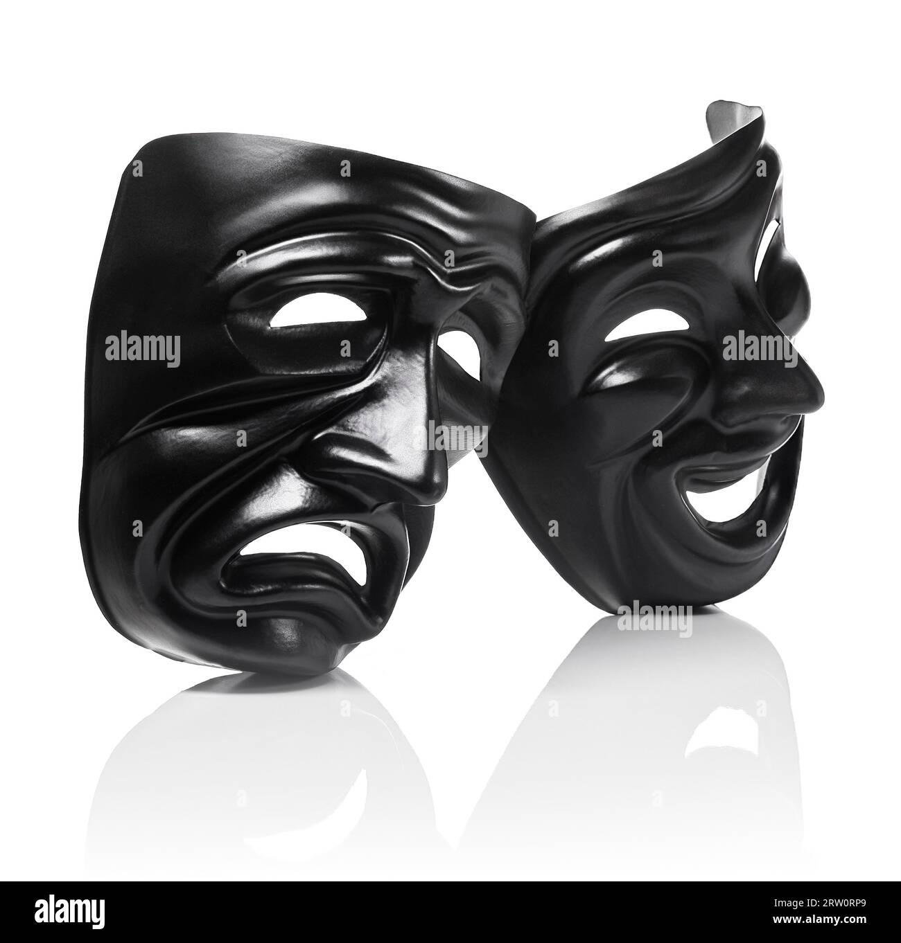 Generico maschere di plastica come simboli teatrale isolato su bianco con la riflessione Foto Stock