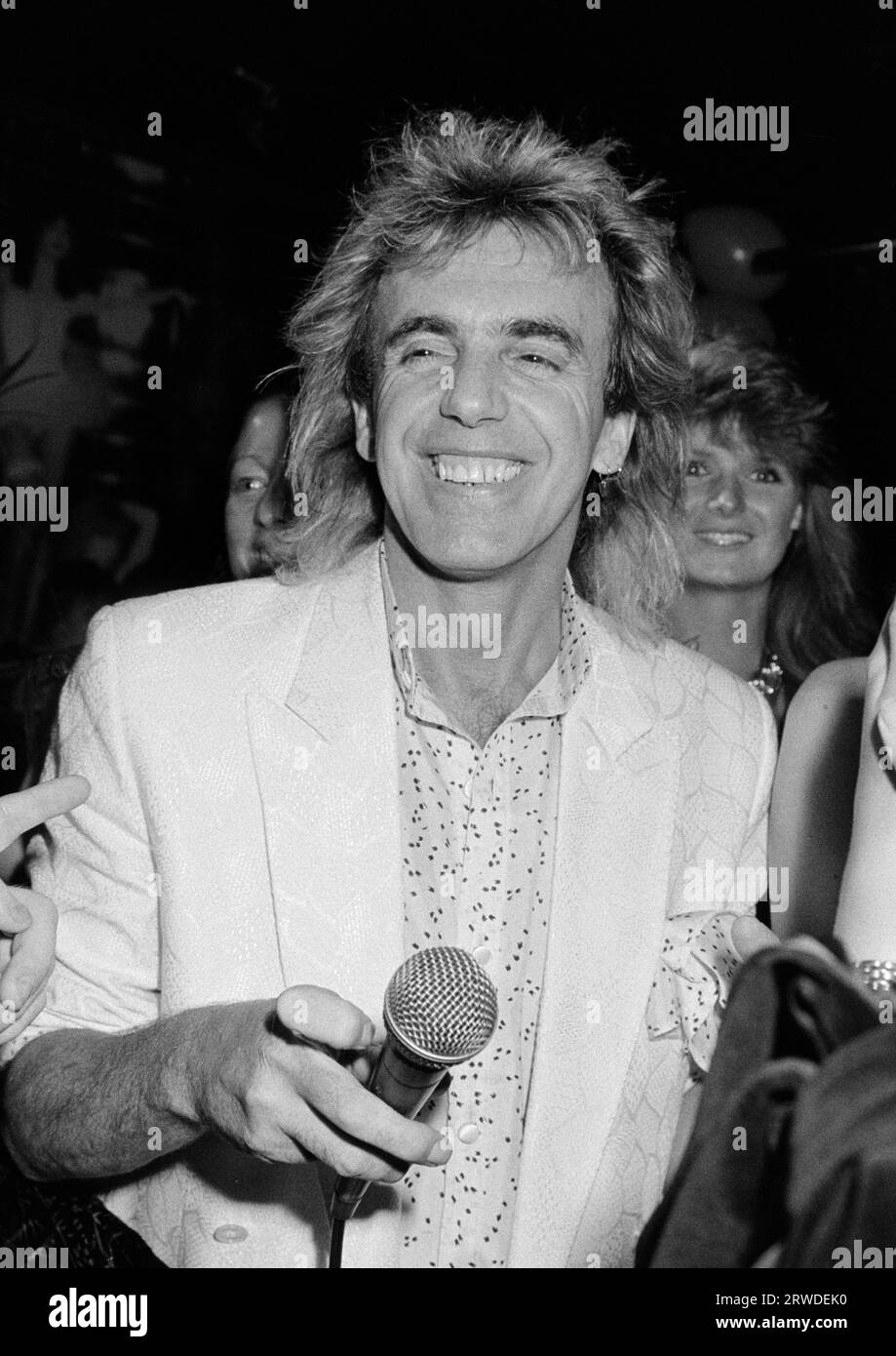 LONDRA, REGNO UNITO. c.1986: Clubowner Peter Stringfellow a una festa a Stringfellows a Londra. Foto del file © Paul Smith/Featureflash Foto Stock