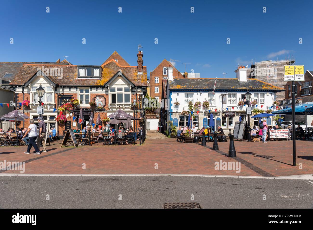 The Jolly Sailor e i pub e ristoranti sul lungomare di Lord Nelson su Poole Quay, Poole, Dorset, Inghilterra, Regno Unito Foto Stock