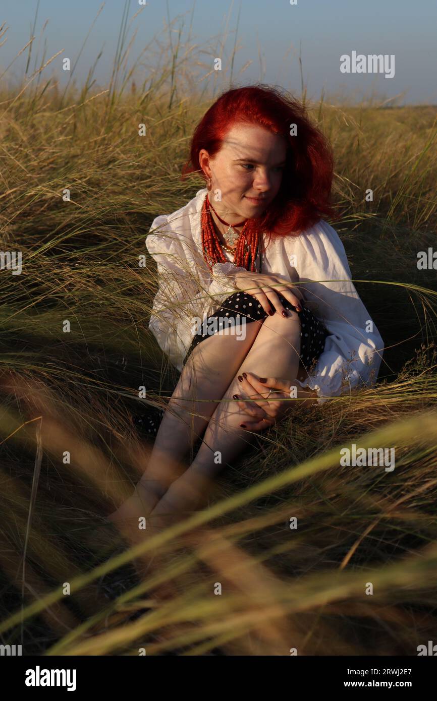Ragazza rossa Foto Stock