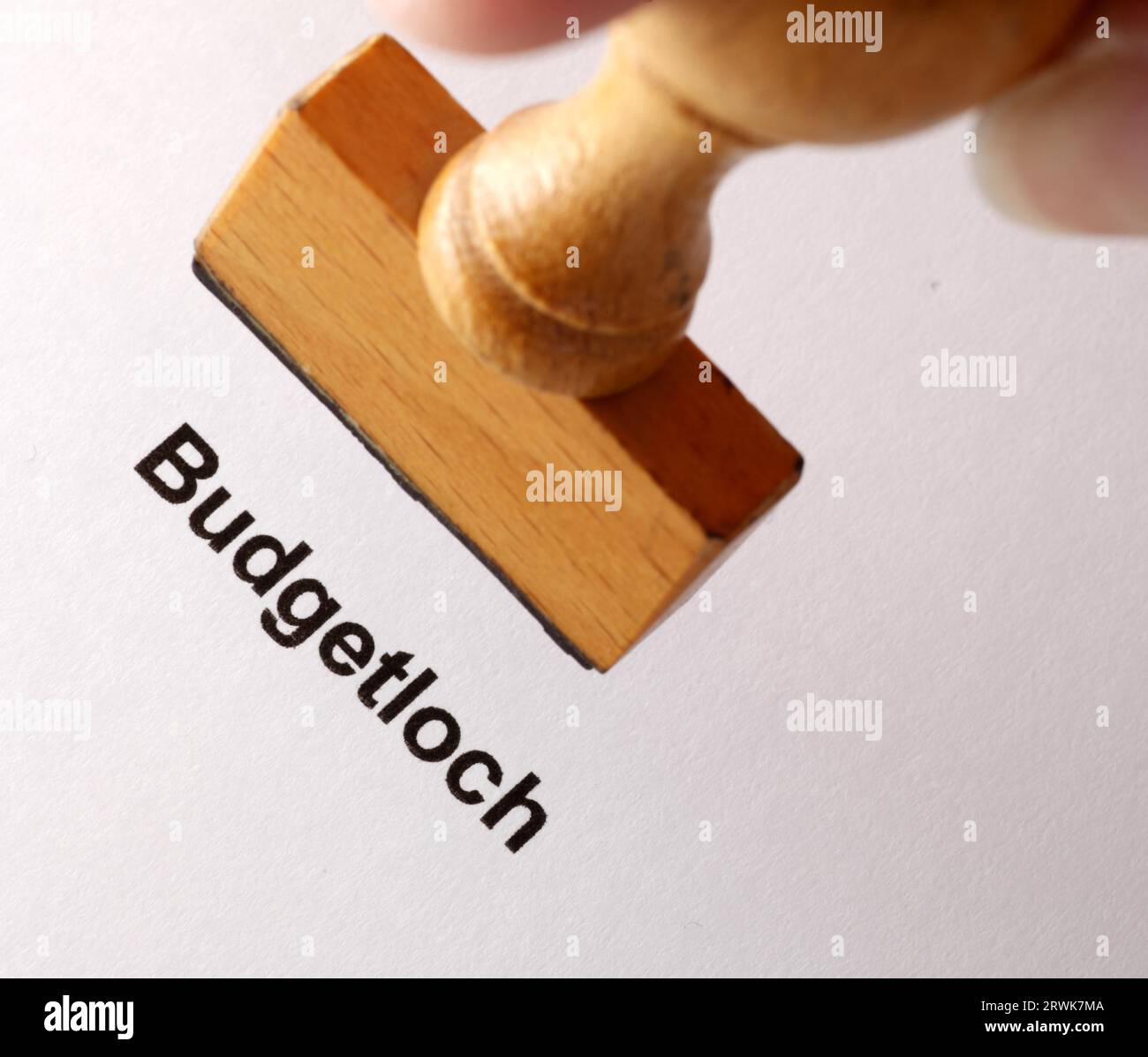 Stempeltext Budgetloch Foto Stock