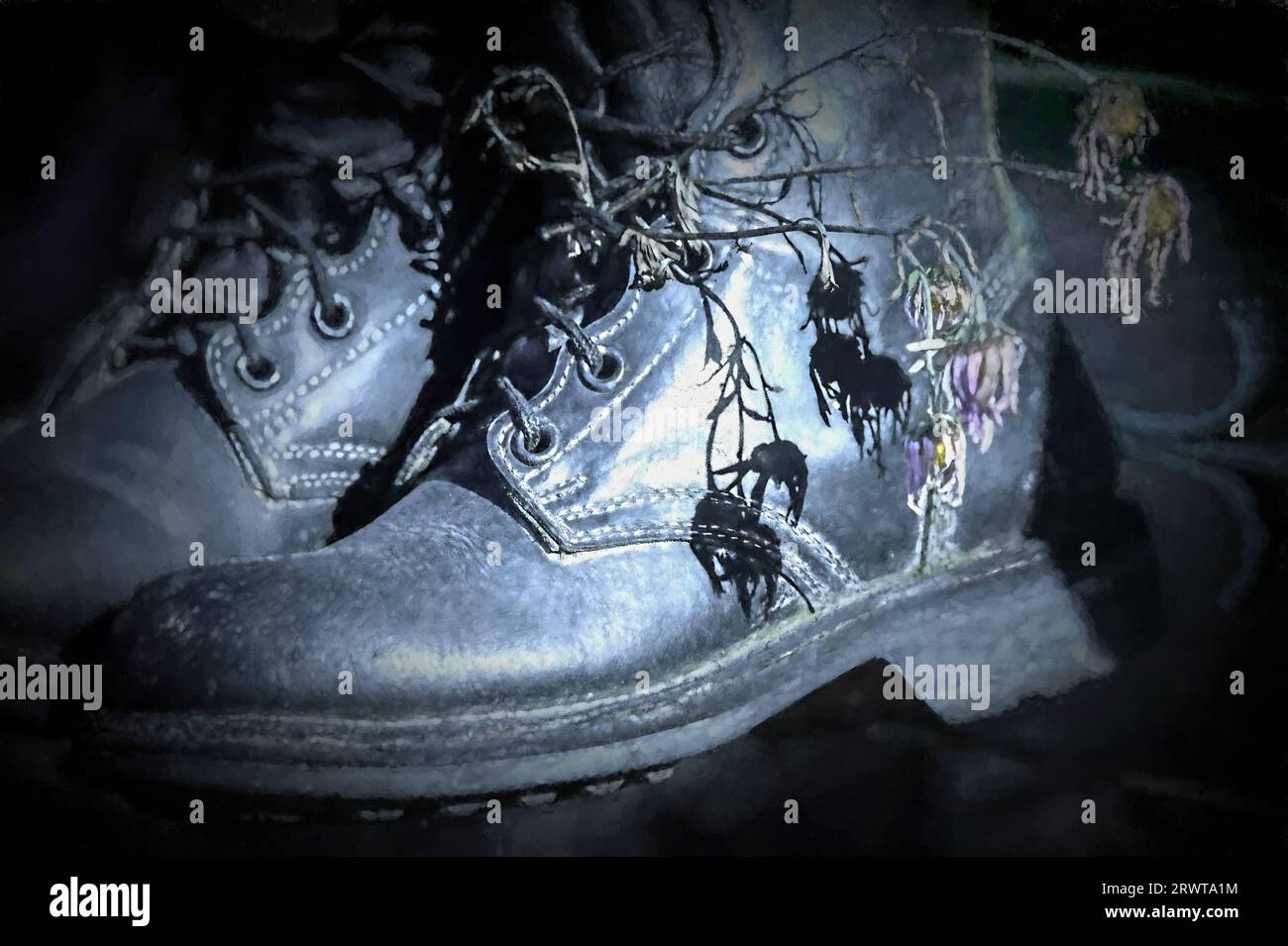 Stivali con fiori morti - immagine concettuale della futilità e della perdita della guerra Foto Stock