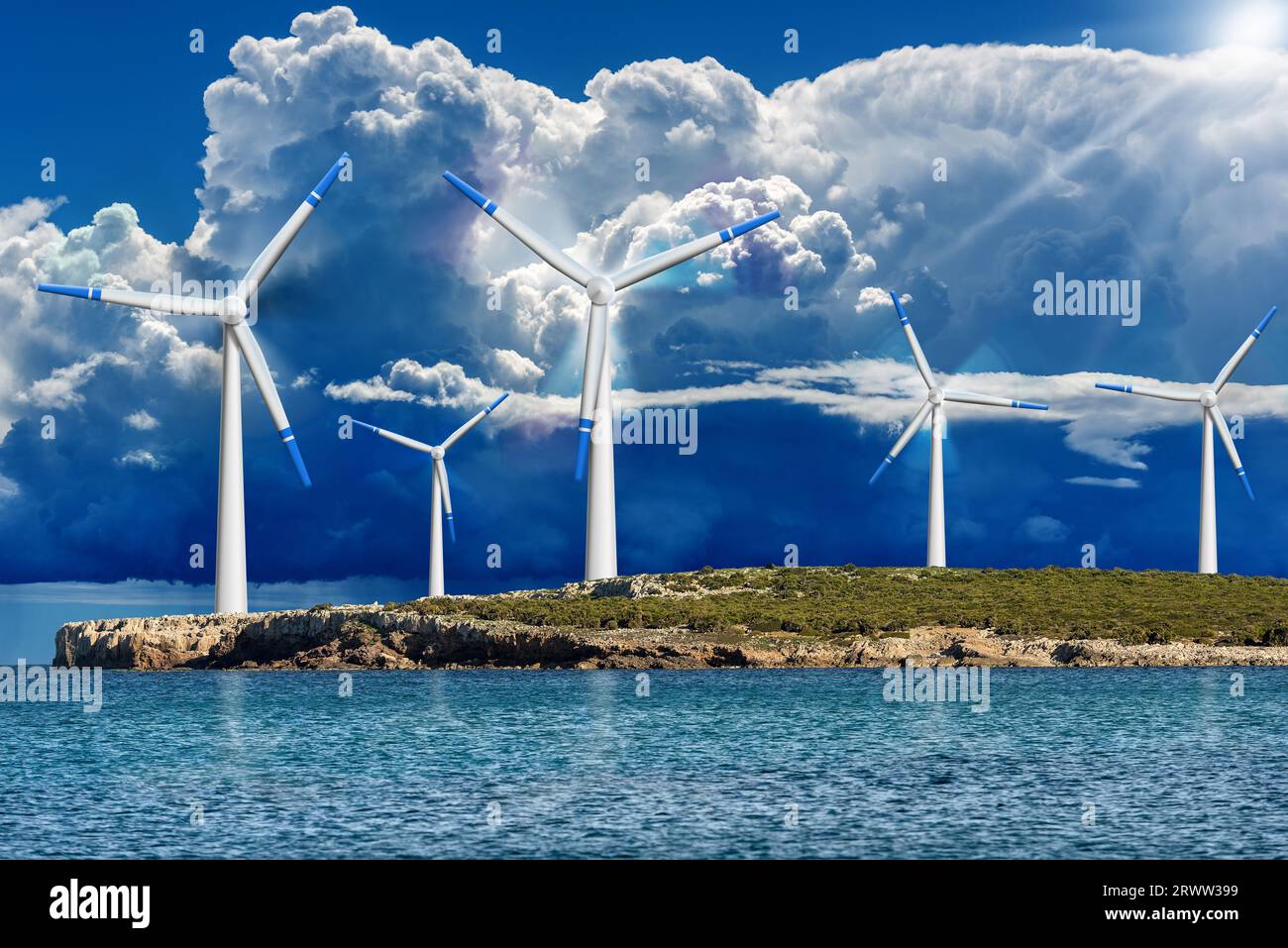 Gruppo di turbine eoliche bianche e blu sopra un'isola nel mare contro una tempesta di nuvole. Fotografia. Concetto di energia rinnovabile. Foto Stock