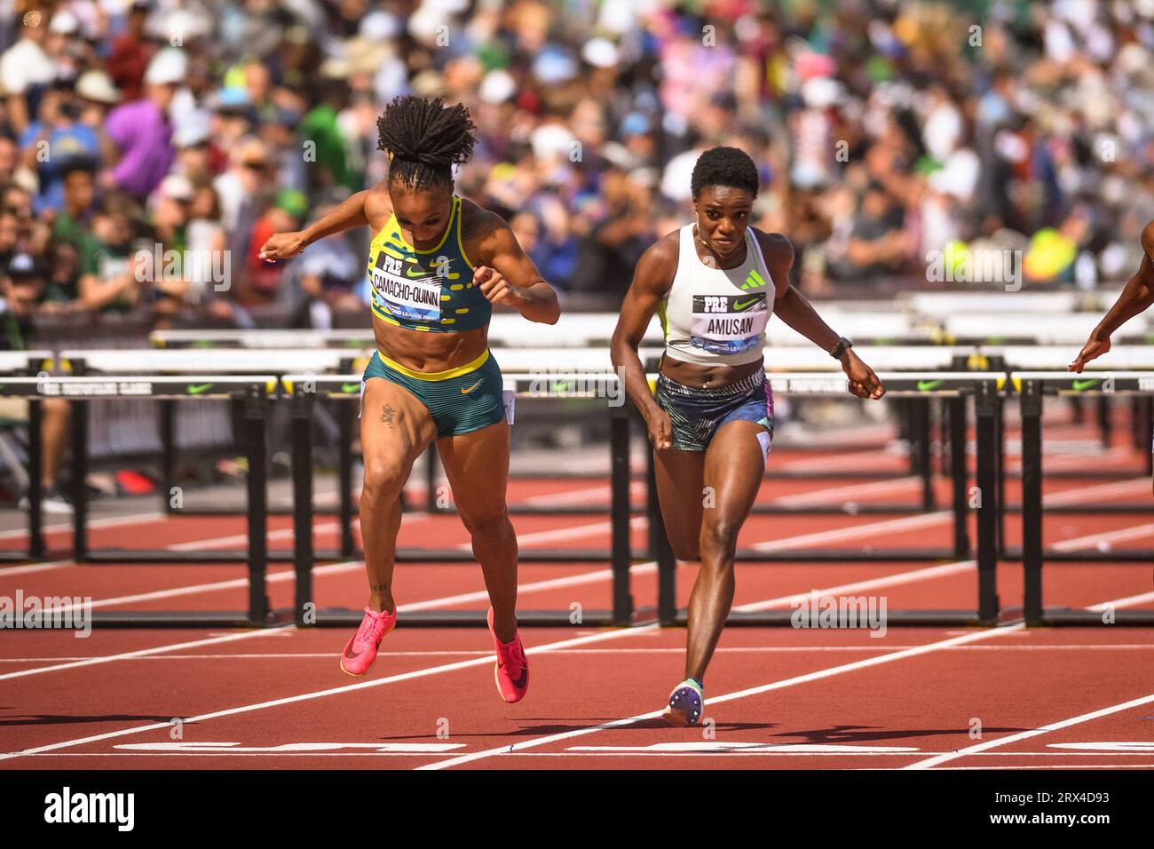 Jasmine Camacho-Quinn (pur) e Tobi Amusan (NGR) corrono fino al traguardo nei 100m ostacoli femminili ai Campionati Diamond League ai Pre-classi Foto Stock