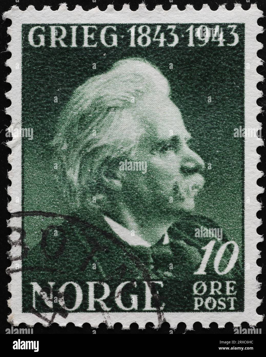 Compositore Edvard Grieg su vecchio francobollo norvegese Foto Stock