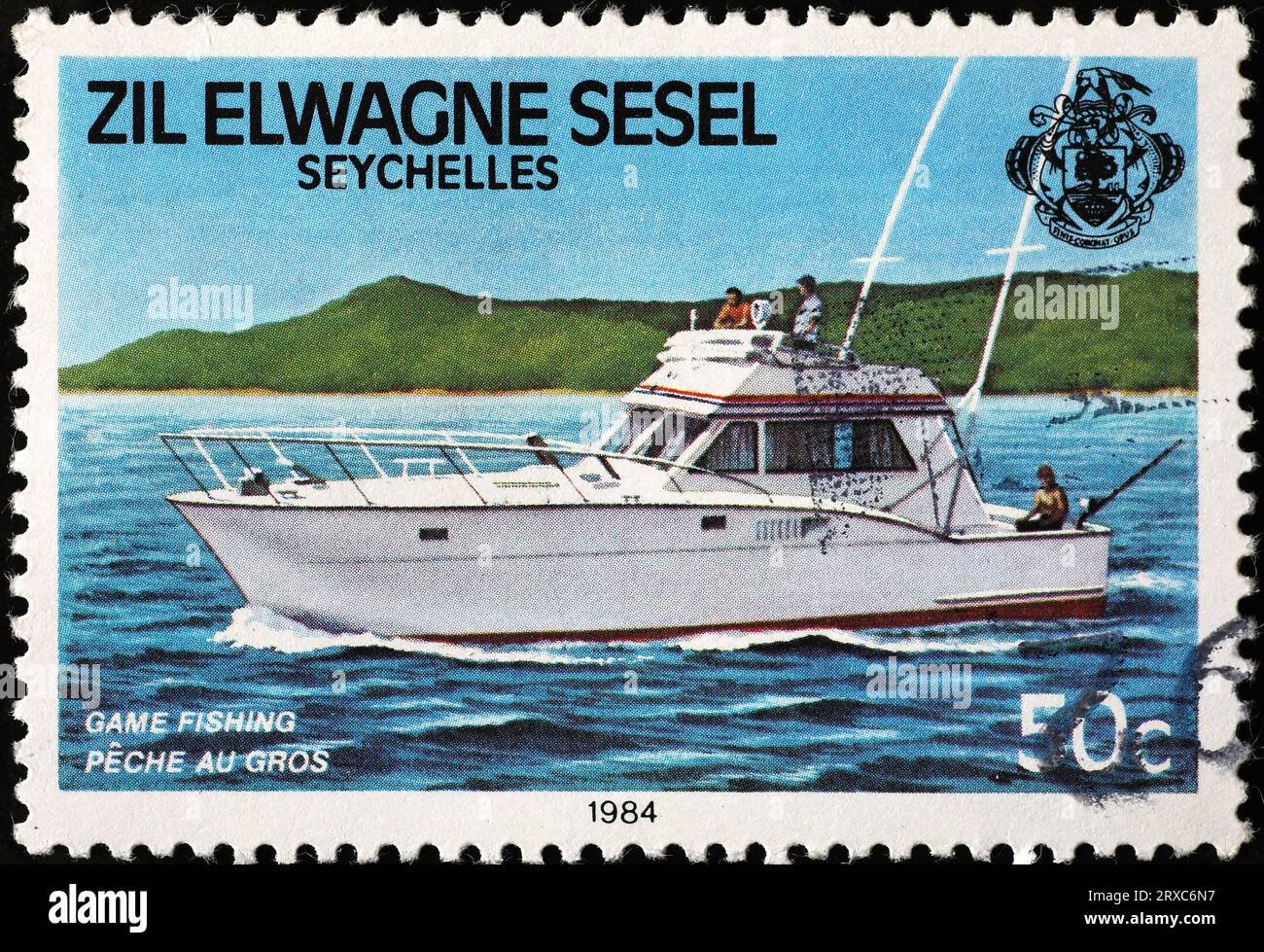 Festa della pesca di caccia su francobolli delle Seychelles Foto Stock