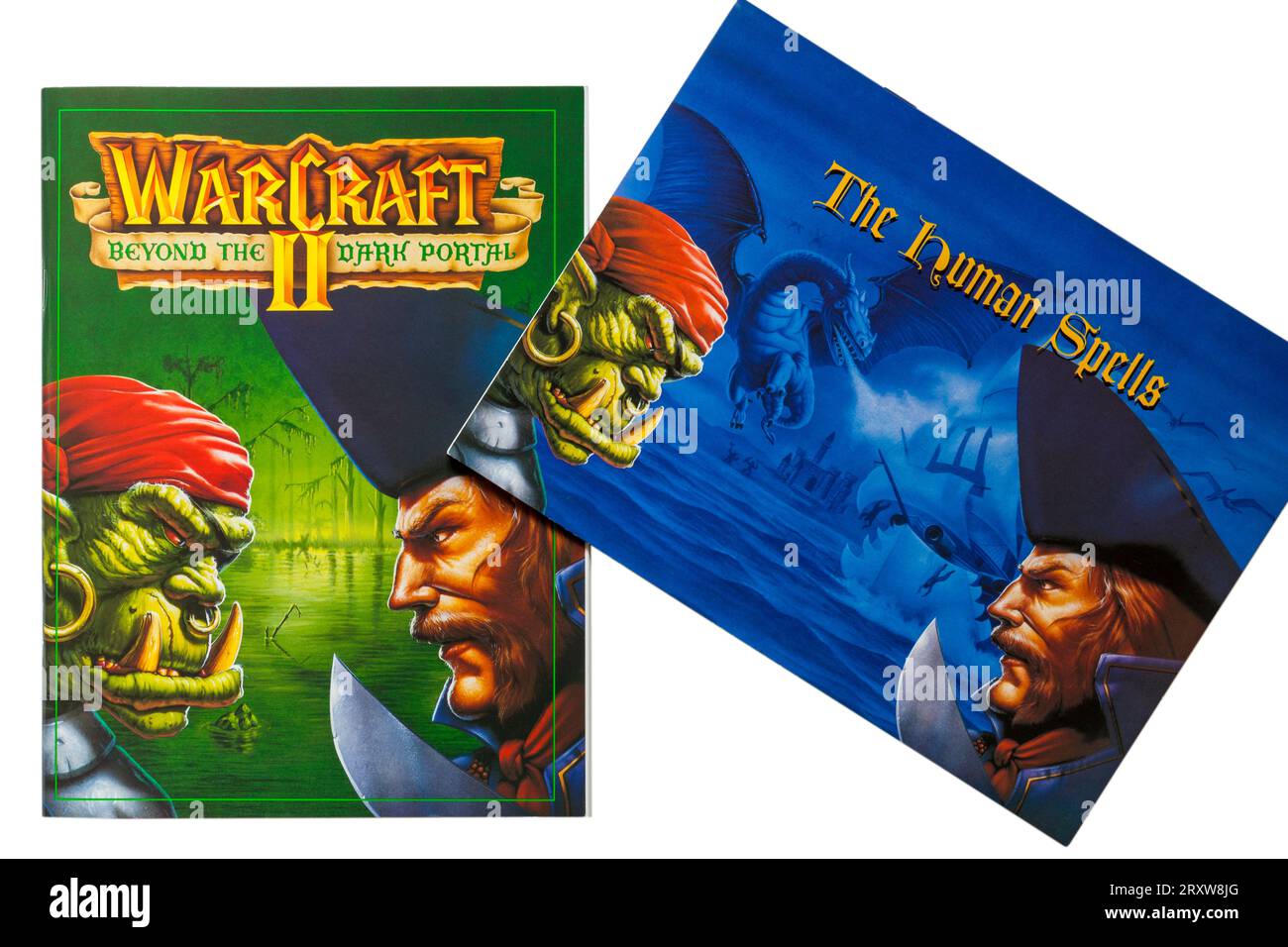 Warcraft II Tides of Darkness in edizione deluxe, Warcraft II Beyond the Dark Portal e Human Spells su sfondo bianco Foto Stock