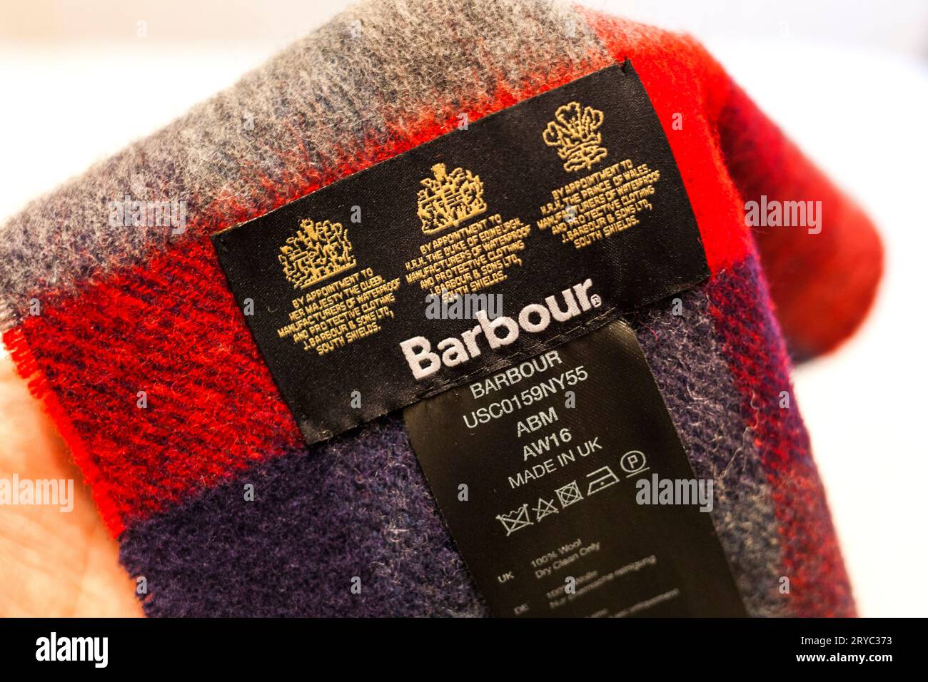 Mandati reali su una sciarpa Barbour. Foto Stock