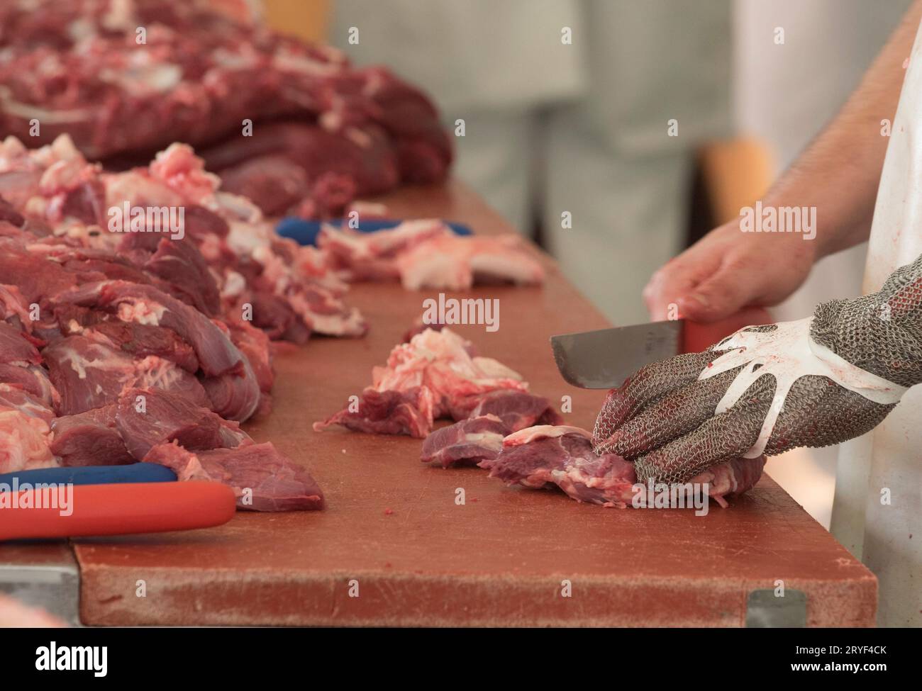 Macellaio e commercio con la carne Foto Stock