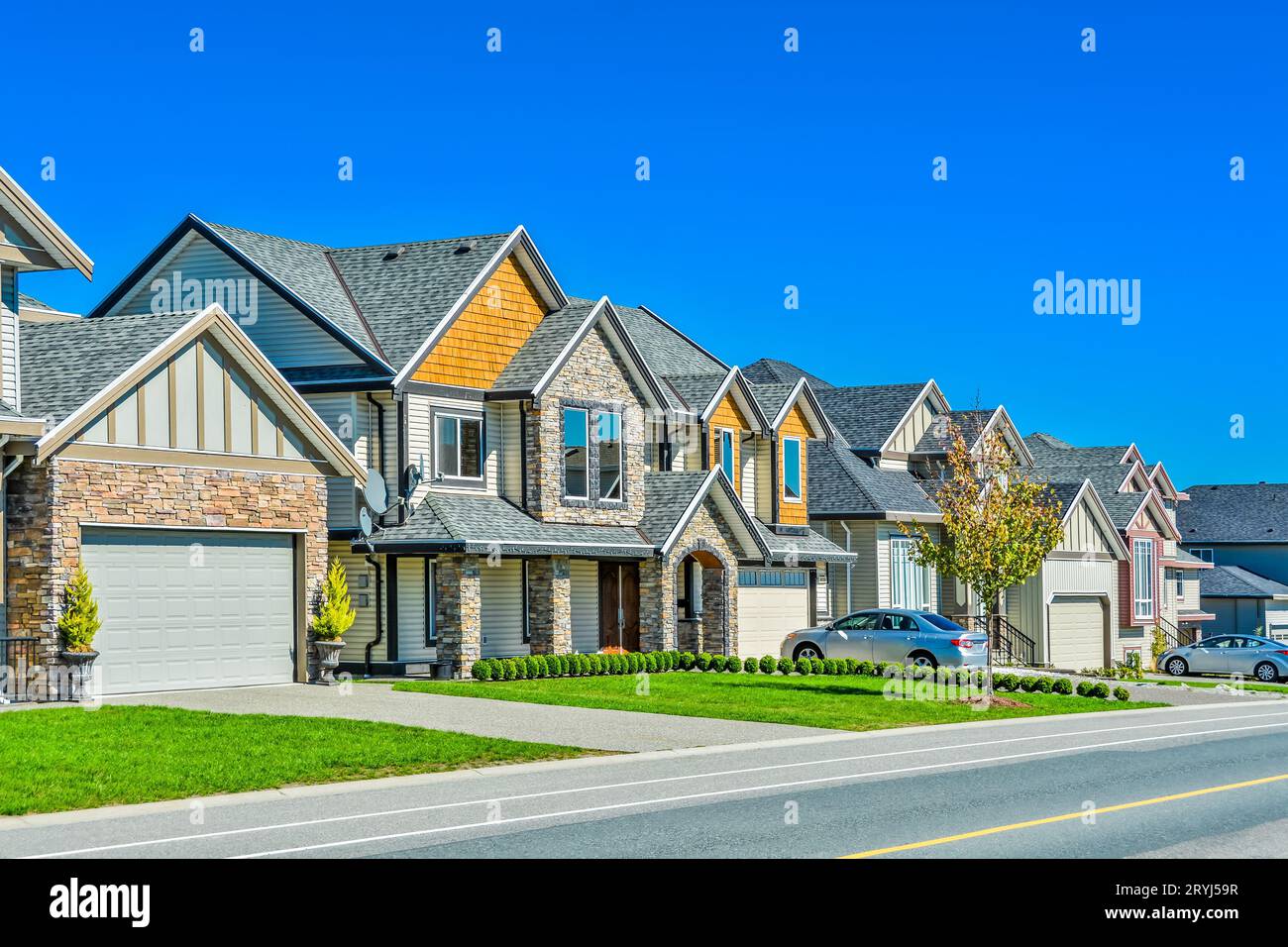 Un quartiere perfetto di case familiari nella zona suburbana di Vancouver Foto Stock
