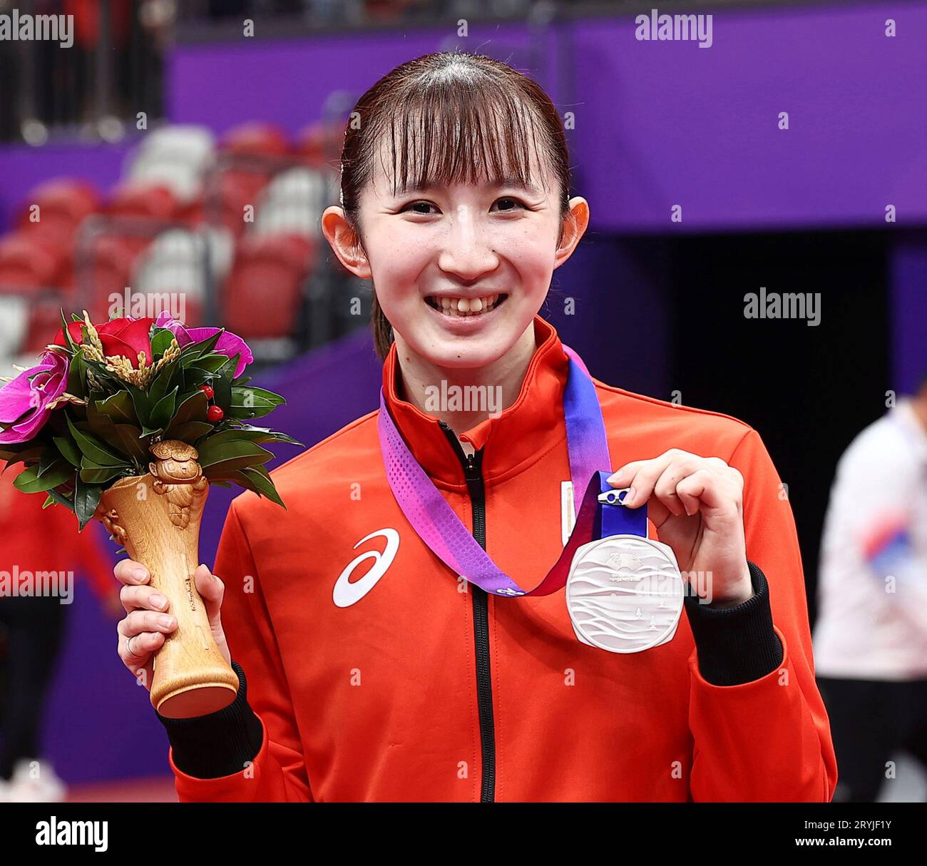Japanese Hina Hayata shows her silver medal during the award ceremony ...