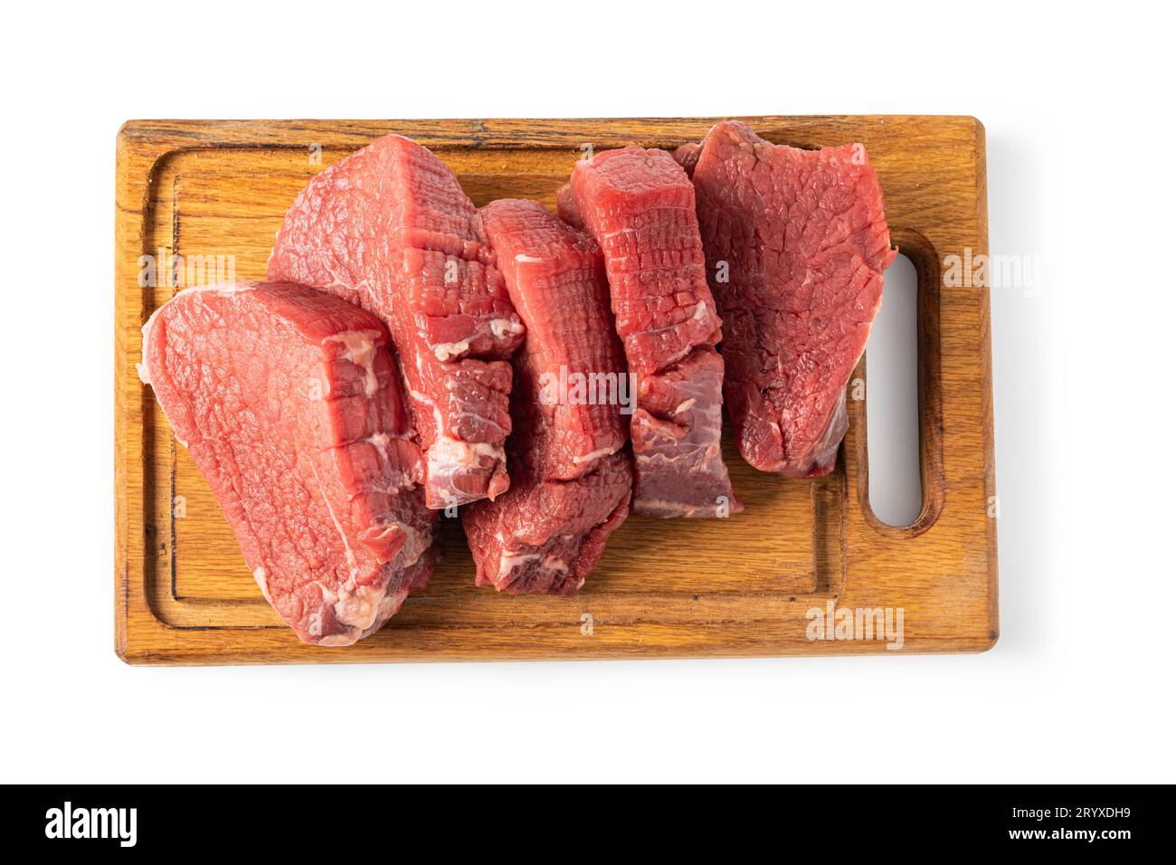 Materie bistecca su un tagliere Foto Stock