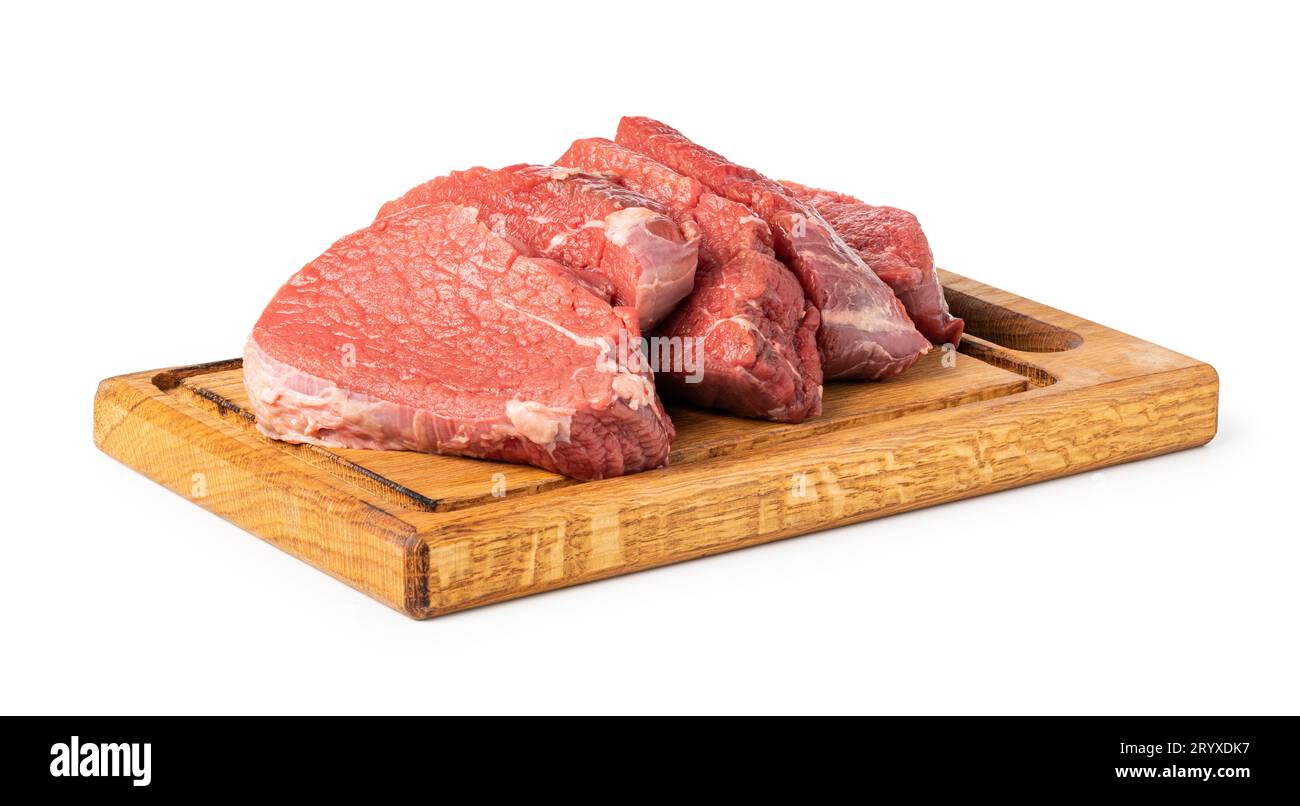 Materie bistecca su un tagliere Foto Stock