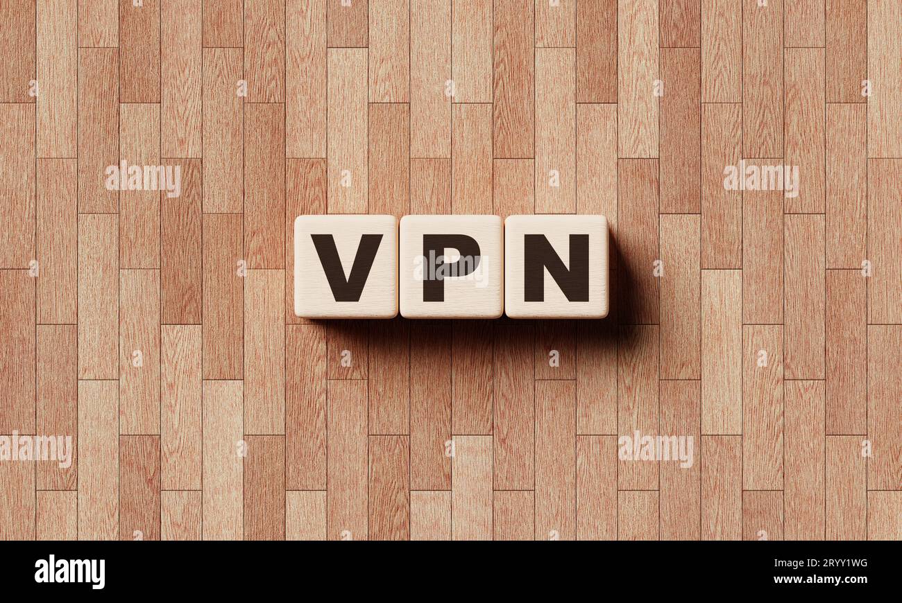 Cubi di blocchi di parole VPN in legno con sfondo laminato. Privacy e anonimato online tramite la creazione di una rete privata virtuale Foto Stock