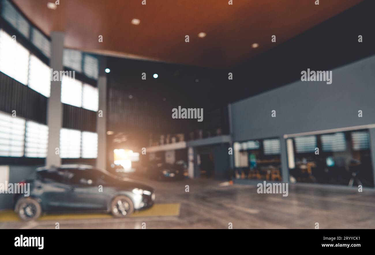 Sfocare lo sfondo di showroom auto garage. Automotive auto aziendali e concetto di trasporto. Abstract background. Foto Stock
