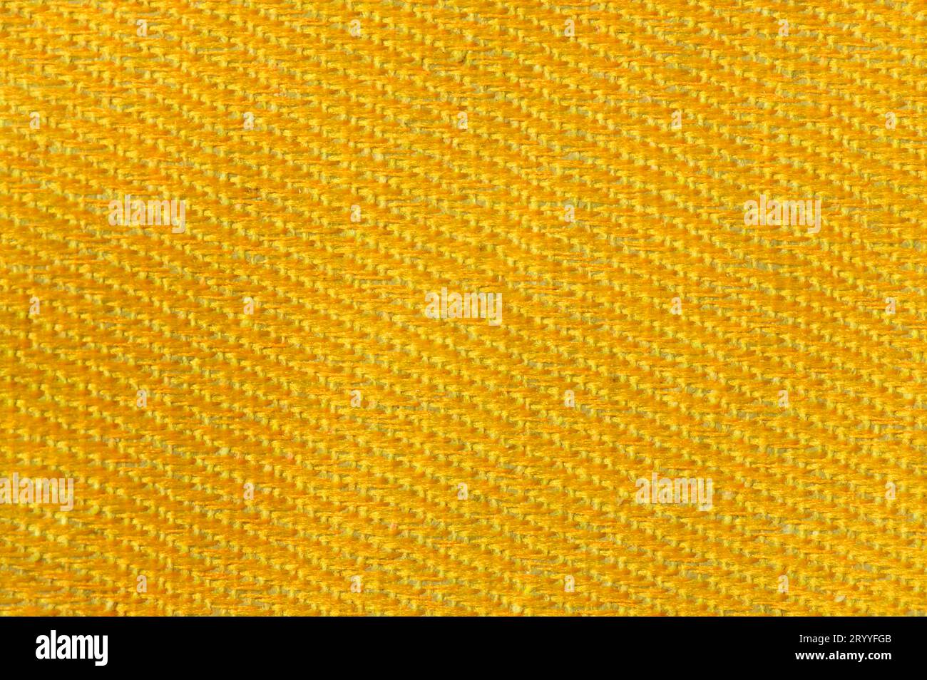 Oro giallo tela texture dello sfondo. Prodotti tessili e concetto di decorazione. Carta da parati e interior design Foto Stock