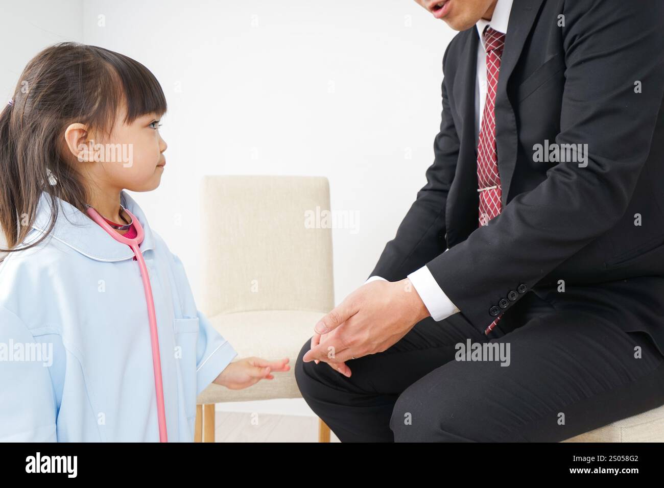 Medico e uomo d'affari Foto Stock