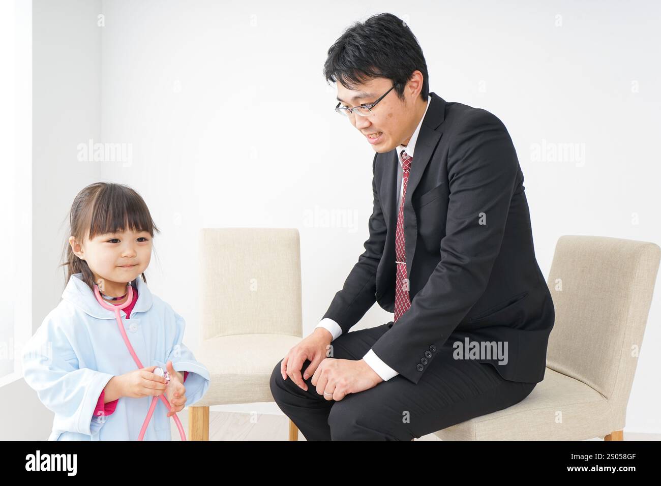 Medico e uomo d'affari Foto Stock