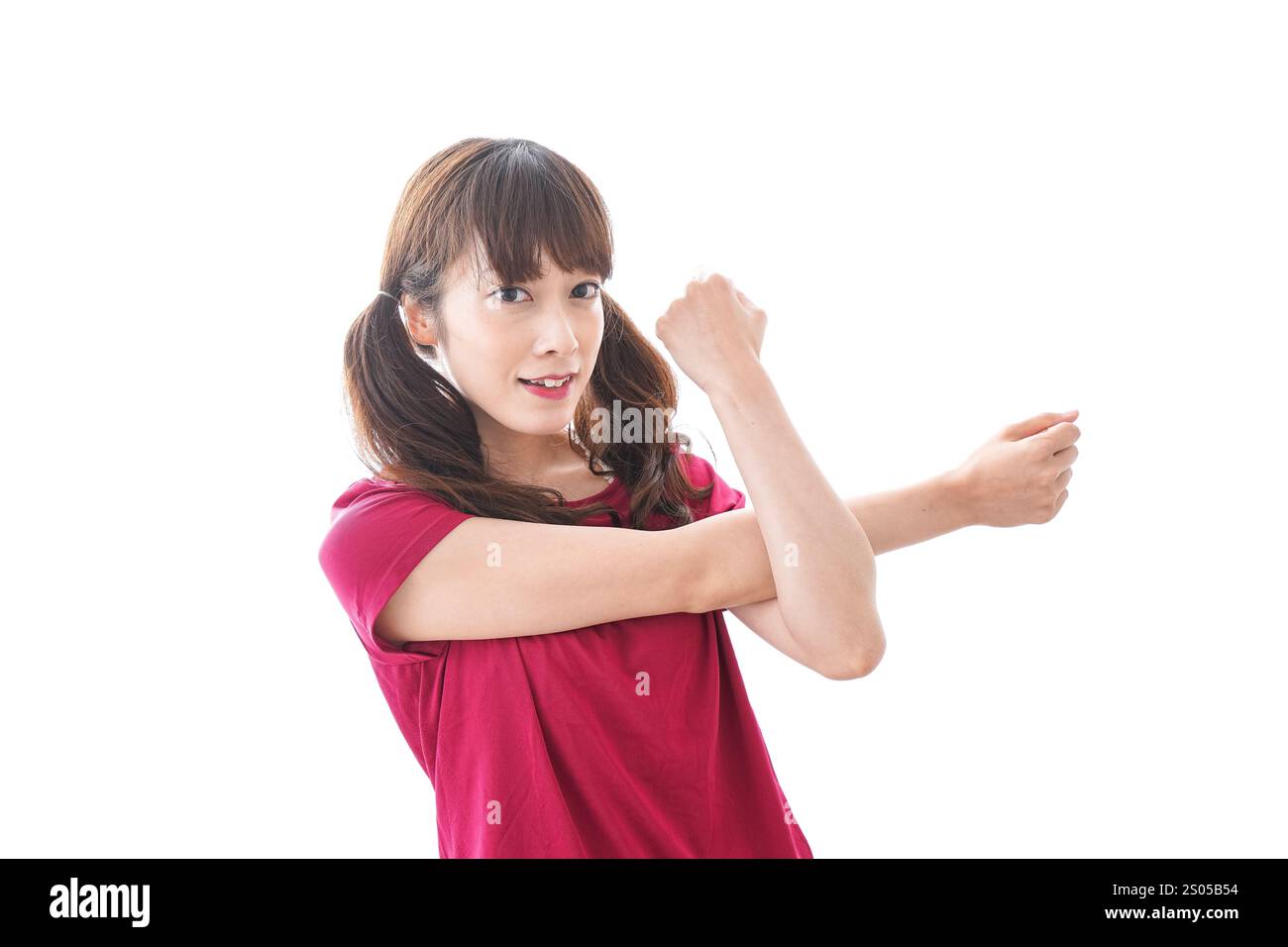 Donna che fa esercizio preparatorio Foto Stock