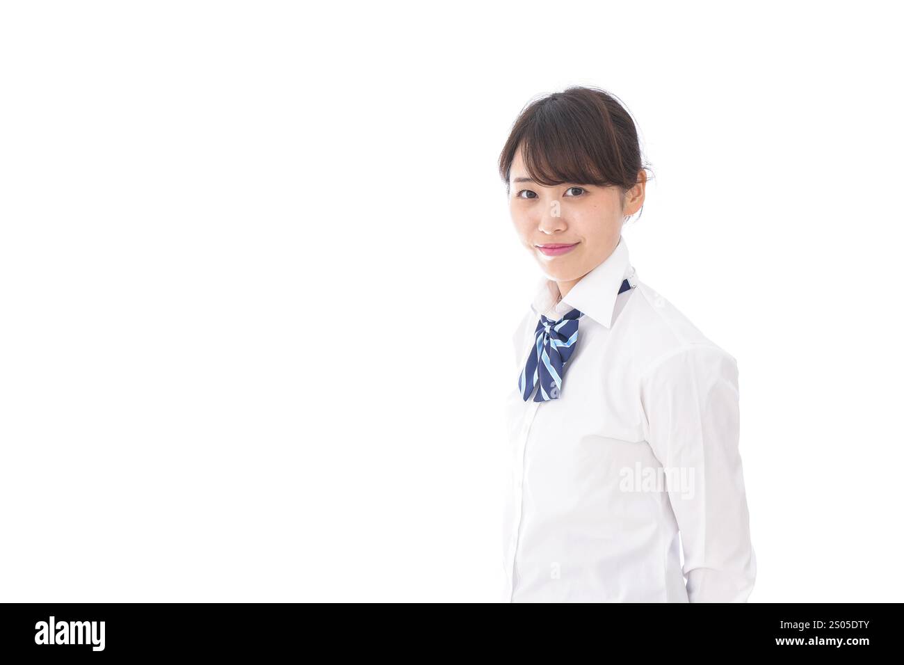 La scolaretta sorridente Foto Stock