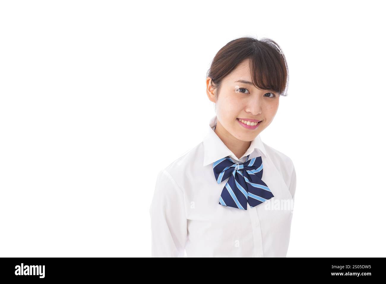 La scolaretta sorridente Foto Stock