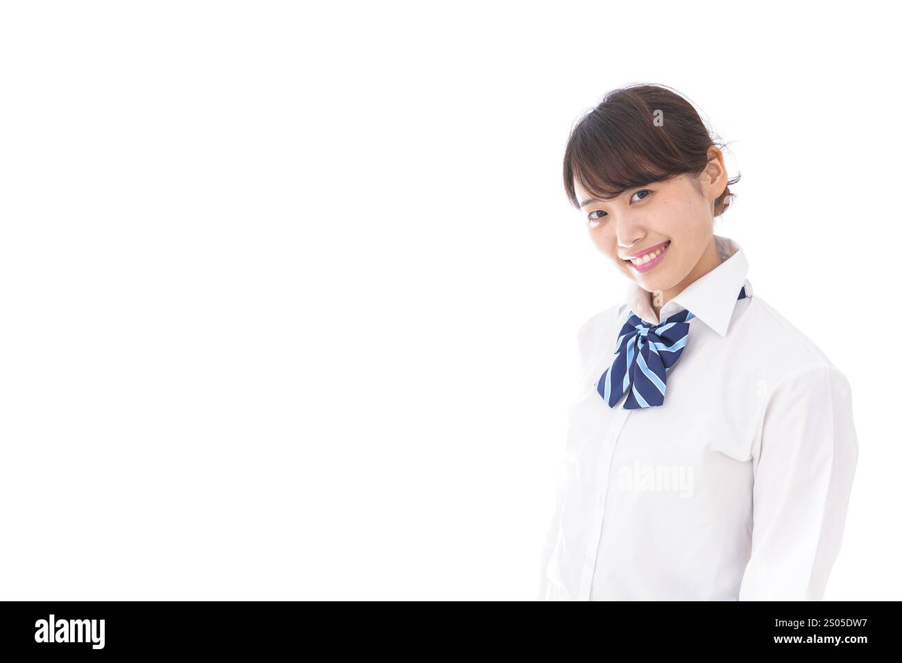 La scolaretta sorridente Foto Stock