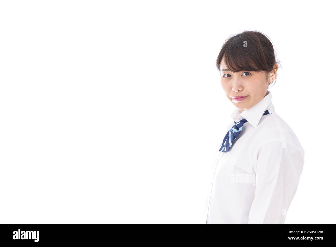 La scolaretta sorridente Foto Stock