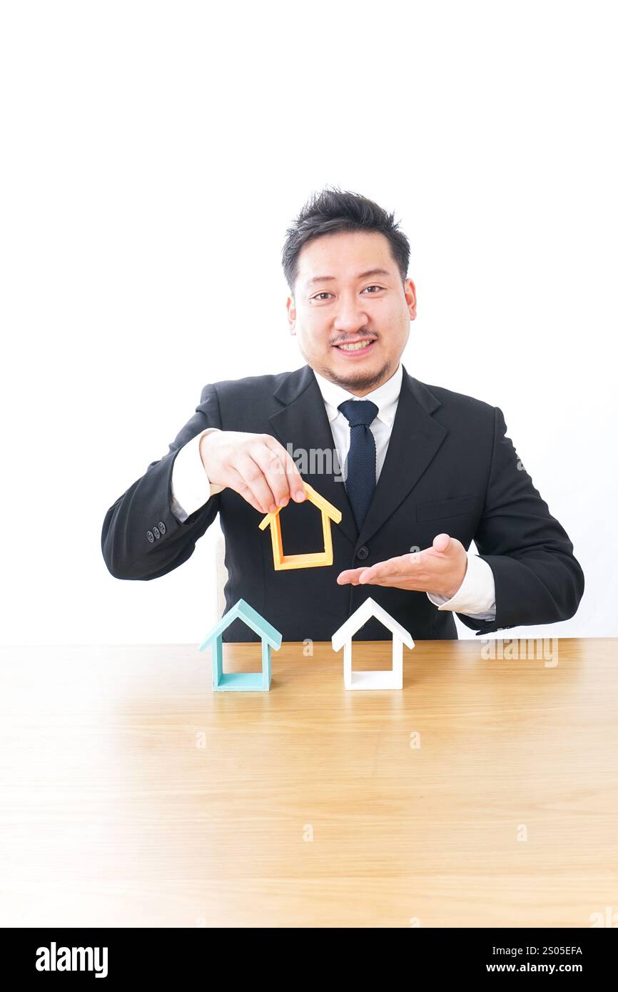 Uomo d'affari che fa un accordo immobiliare Foto Stock
