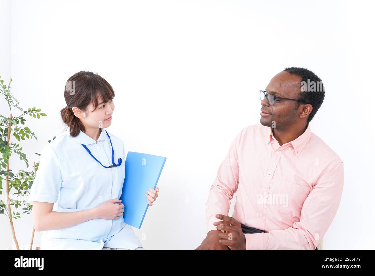 Assistenza medica e stranieri Foto Stock