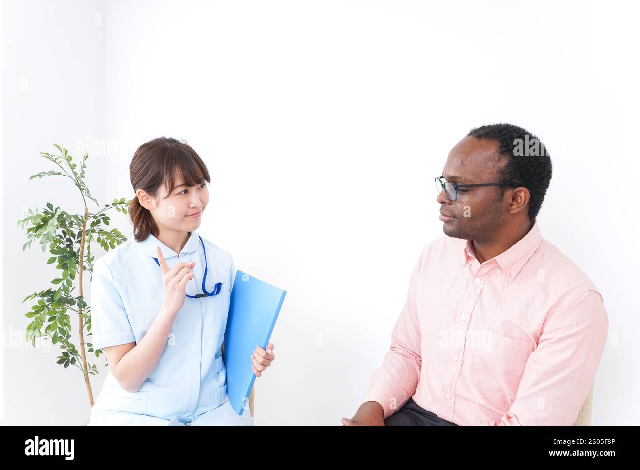 Assistenza medica e stranieri Foto Stock