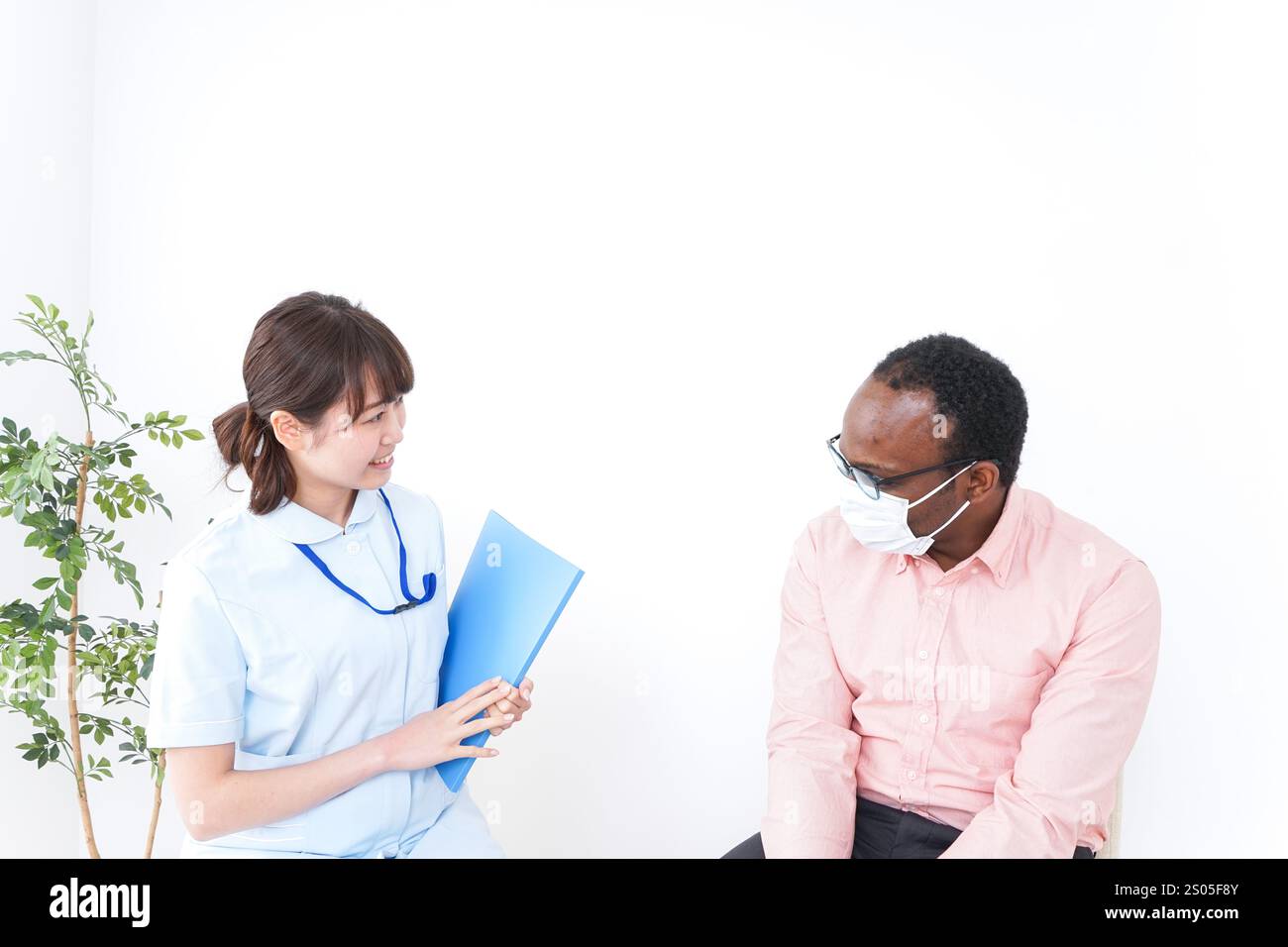 Assistenza medica e stranieri Foto Stock