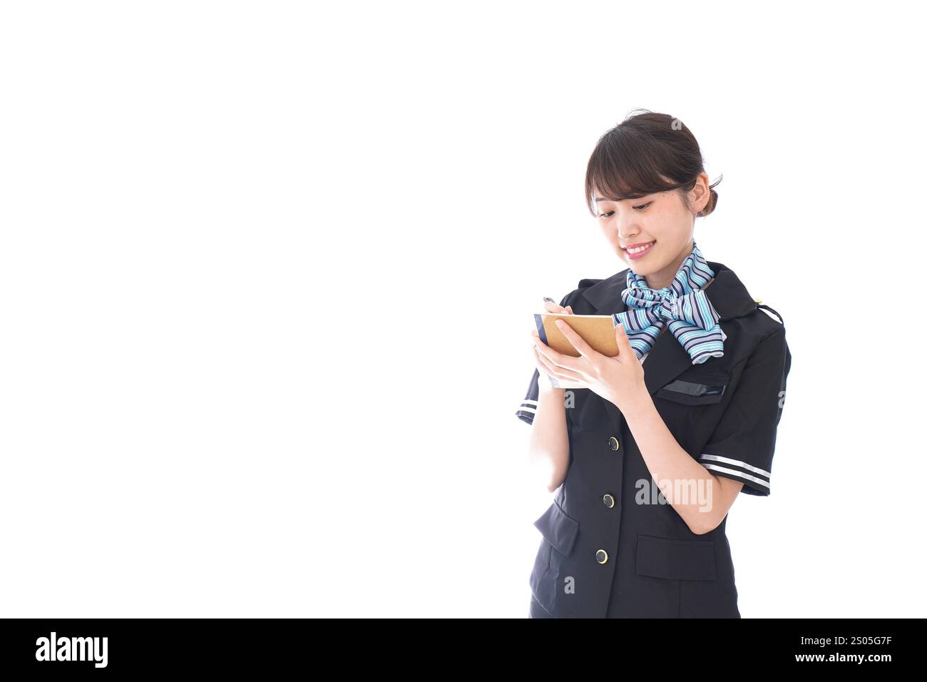 L'addetto di cabina prende appunti Foto Stock