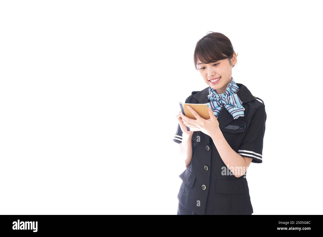 L'addetto di cabina prende appunti Foto Stock