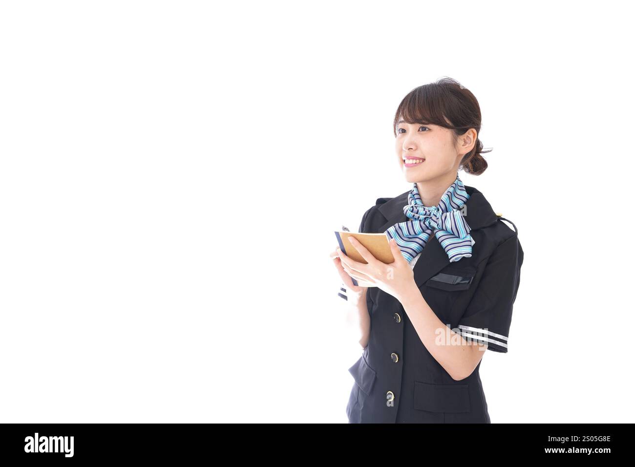 L'addetto di cabina prende appunti Foto Stock