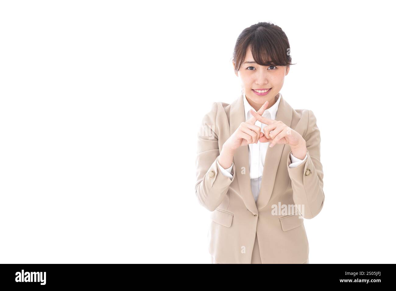 Donna d'affari che fa il segno batu Foto Stock