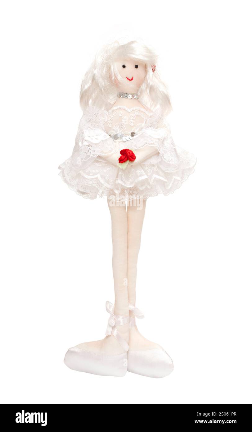 Bambola di straccio ballerina con rose rosse in mano Foto Stock