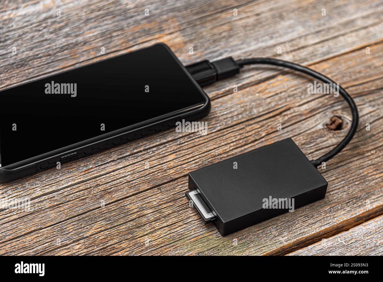 Il lettore di schede è collegato a un dispositivo mobile Foto Stock