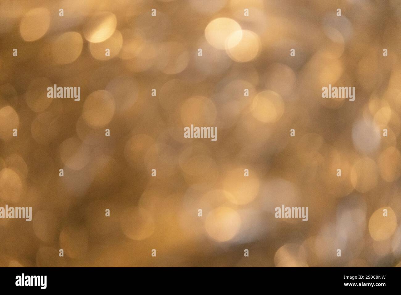 Festoso sfondo bokeh dorato Foto Stock