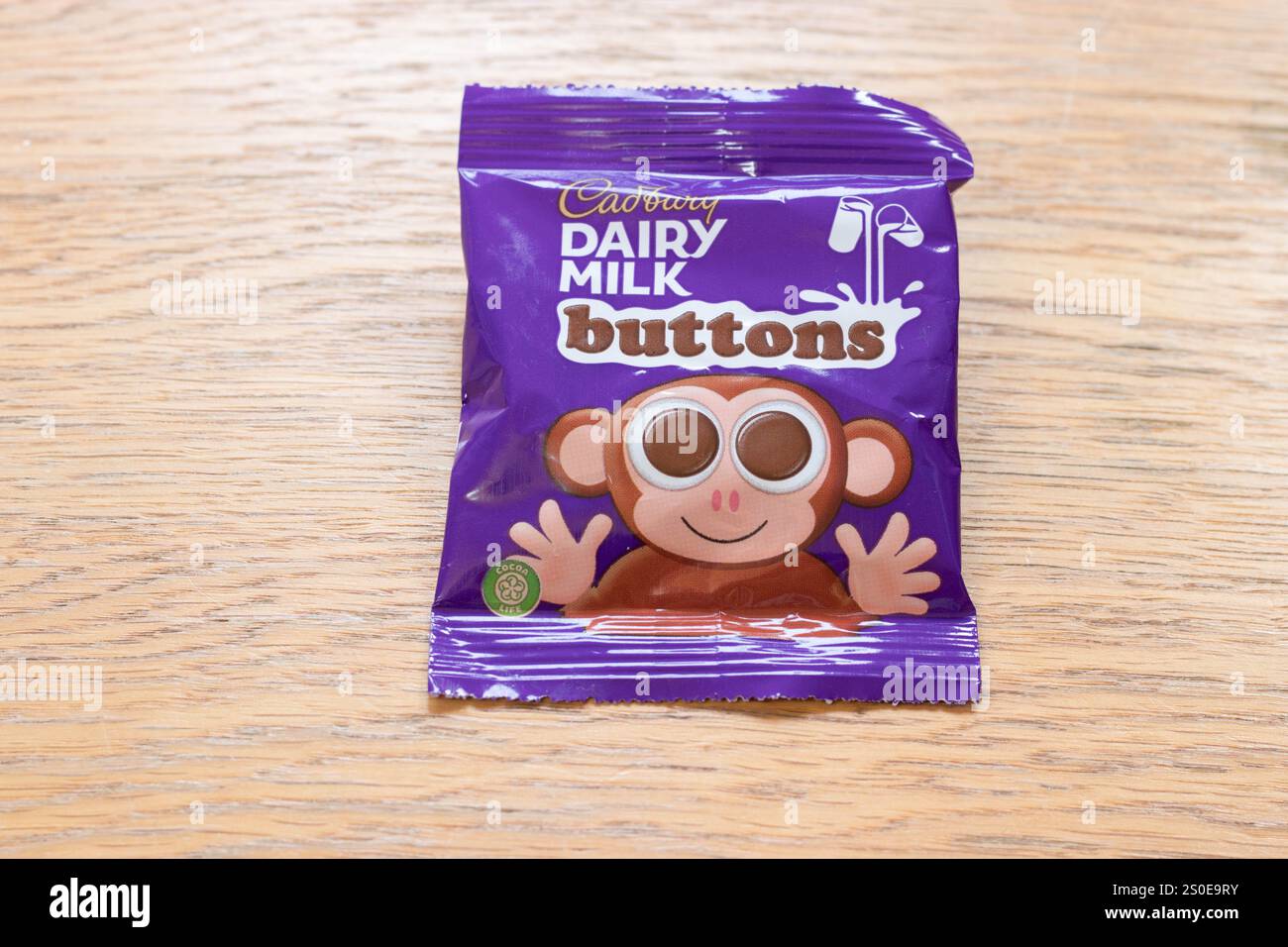Bottoni di cioccolato al latte Cadbury Foto Stock