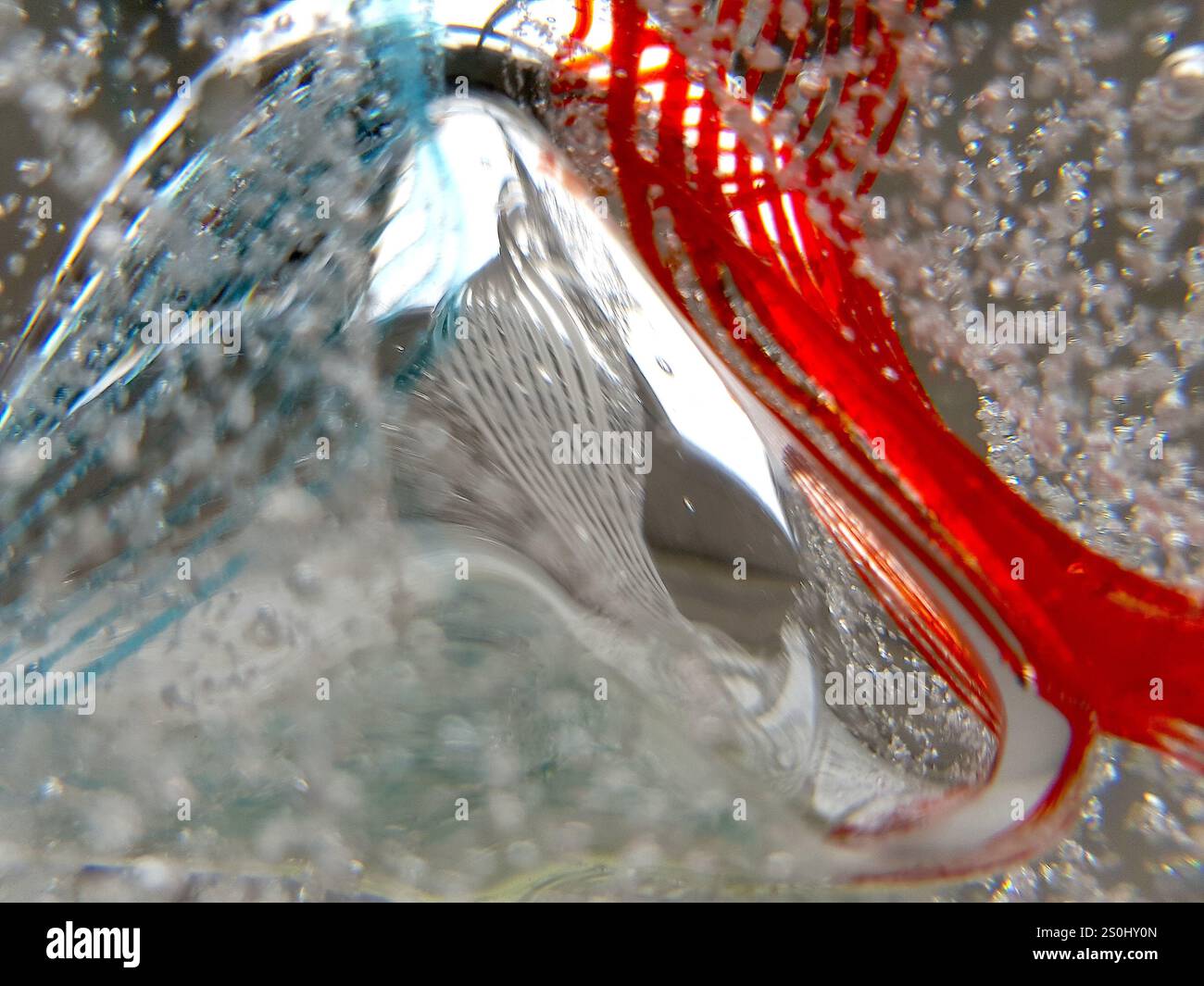Un primo piano di vetro decorativo che crea uno sfondo astratto. Foto Stock